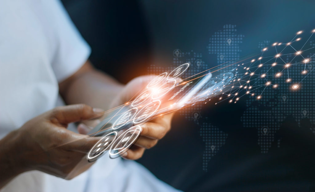 Person holding a phone with holographic digital composite over it